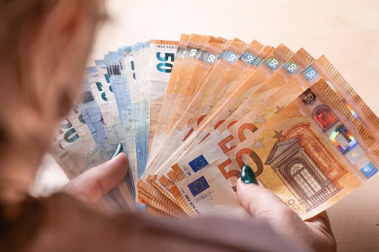 business, finance, saving, banking and people concept close up